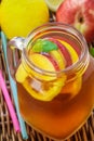 Iced tea with lemon and peach in a Mason jar. Summer soft drink Royalty Free Stock Photo