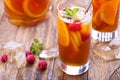 Iced tea with orange and raspberry Royalty Free Stock Photo