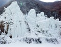 Spectacular ice falls in mountainous area.