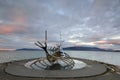 Sun Voyager monument, landmark of Reykjavik city with sea and mountains in background, Iceland Royalty Free Stock Photo