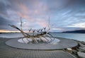 Sun Voyager monument, landmark of Reykjavik city with sea and mountains in background, Iceland Royalty Free Stock Photo