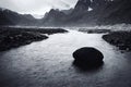 Iceland aerial river flowing between desert rocky shores