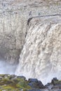 Tourists at Dettifoss. The waterfall is situated in VatnajÃÂ¶kull National Park in Northeast Iceland, and