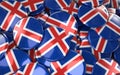 Iceland Badges Background - Pile of Icelandic Flag Buttons.