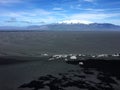 Iceland black sand landscape with mountain in background