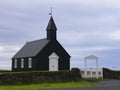 ICELAND, BÃÅ¡ÃÂIR - JULY 05, 2009; BÃÂºÃÂ°akirkja is the black church of BÃÂºÃÂ°ir on the south coast of SnÃÂ¦fellsnes