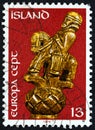 ICELAND - CIRCA 1974: A stamp printed in Iceland shows Horseman 17th century wood carving, circa 1974.