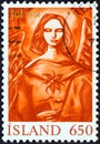 ICELAND - CIRCA 1984: A stamp printed in Iceland shows Angel with Christmas rose, circa 1984.