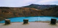 Iceland crater vulcan lake clear water blue bench hill cliff mountain