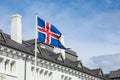 Iceland flag against summer sky. Reykjavik