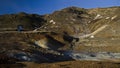 Fumarole fields of Iceland covered with yellow brimstone with boiling mud craters against the winter sky Royalty Free Stock Photo