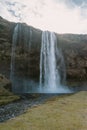 Iceland landscape photography. beautiful waterfall and clouds and sun in the sky