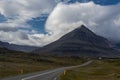 Iceland mountain landscape sky clouds cliff green field road