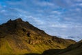 Iceland mountain landscape sky clouds cliff green morning yellow