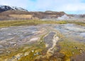 In Iceland a nature landscape view with steamng geysers Royalty Free Stock Photo