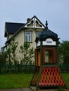 Old phone booth displayed on the meadow in Iceland Royalty Free Stock Photo