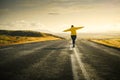 Iceland road trip. Girl is walking alone on road