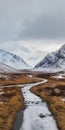 Moody Winter Landscape With Stream And Mountains