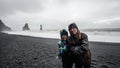 Iceland senior couple tourist at black beach Royalty Free Stock Photo