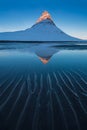 Iceland snaefellsnes peninsula and famous Kirkjufell. Kirkjufell is a beautifully shaped and a symmetric, free standing mountain.