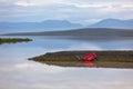 Iceland Water Landscape with Red Boat Royalty Free Stock Photo