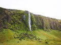 Exploring Iceland waterfalls, drone shot in sunrise