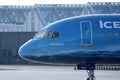 Icelandair plane doing taxi on runway, close-up view of cabin crew