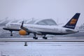 Icelandair plane taking off from Munich Airport, MUC, snow