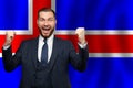 Icelandic happy businessman on the background of flag of Iceland Business, education, degree and citizenship concept