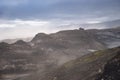 Icelandic Hut on the volcanic landscape during strong ash storm on the Fimmvorduhals hiking trail. Iceland Royalty Free Stock Photo