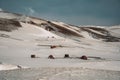 Icelandic landscape with geothermal power plant station kravla with igloo huts and pipes in the valley. Myvatn lake Royalty Free Stock Photo