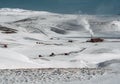 Icelandic landscape with geothermal power plant station kravla with igloo huts and pipes in the valley. Myvatn lake Royalty Free Stock Photo