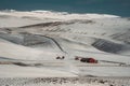 Icelandic landscape with geothermal power plant station kravla with igloo huts and pipes in the valley. Myvatn lake Royalty Free Stock Photo