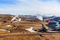 Icelandic landscape with geothermal power plant station and pipe Royalty Free Stock Photo