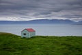 Icelandic landscape. A tin shack at the ocean. Peninsula Skagi, SkagafjÃÂ¶rdur