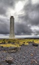 Icelandic lighthouse against a stormy sky Royalty Free Stock Photo