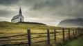 Icelandic style church sits in fenced field, in windswept landscape