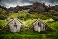 Icelandic turf houses and rocky canyon with waterfall in the background near Kalfafell vilage, South Iceland