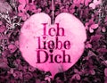 Ich liebe dich translation in German: I love you - written on heart shape leaf (Hibiscus tiliaceus