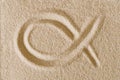 Ichthys, Jesus Fish symbol, drawn in sand macro photo Royalty Free Stock Photo