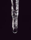 Icicle on a black background Royalty Free Stock Photo