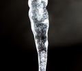 Icicle on a black background Royalty Free Stock Photo