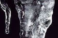 Icicle on a black background Royalty Free Stock Photo