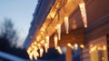 Icicle Christmas Lights on a Snowy Eave Royalty Free Stock Photo