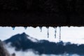 Icicle close up with Mount Huang as background Royalty Free Stock Photo