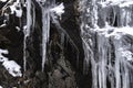 Icicle formations on the mountain rock Royalty Free Stock Photo
