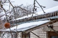 Icicle from freezing rain water creating dripping from roof Royalty Free Stock Photo