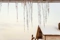 Icicles on the edge of roof overhang