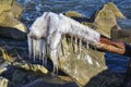 Icicles and frozen rocks on the Baltic Sea. Beautiful winter landscape Royalty Free Stock Photo