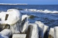 Icicles and frozen rocks on the Baltic Sea. Beautiful winter landscape Royalty Free Stock Photo